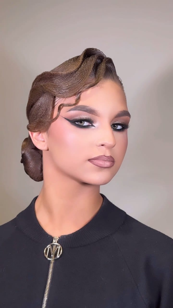 Chic twisted side bun for unobstructed dance movements