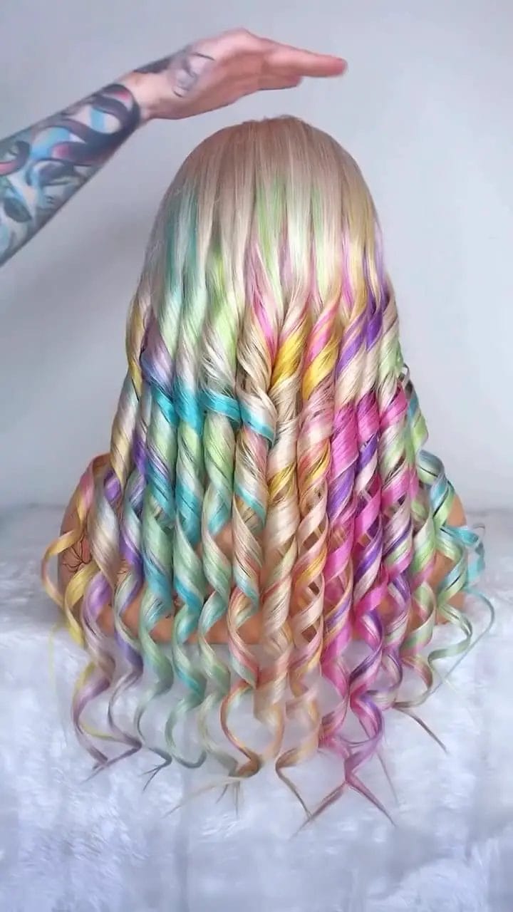 Unicorn mane in pastel hues on long, bouncy curls
