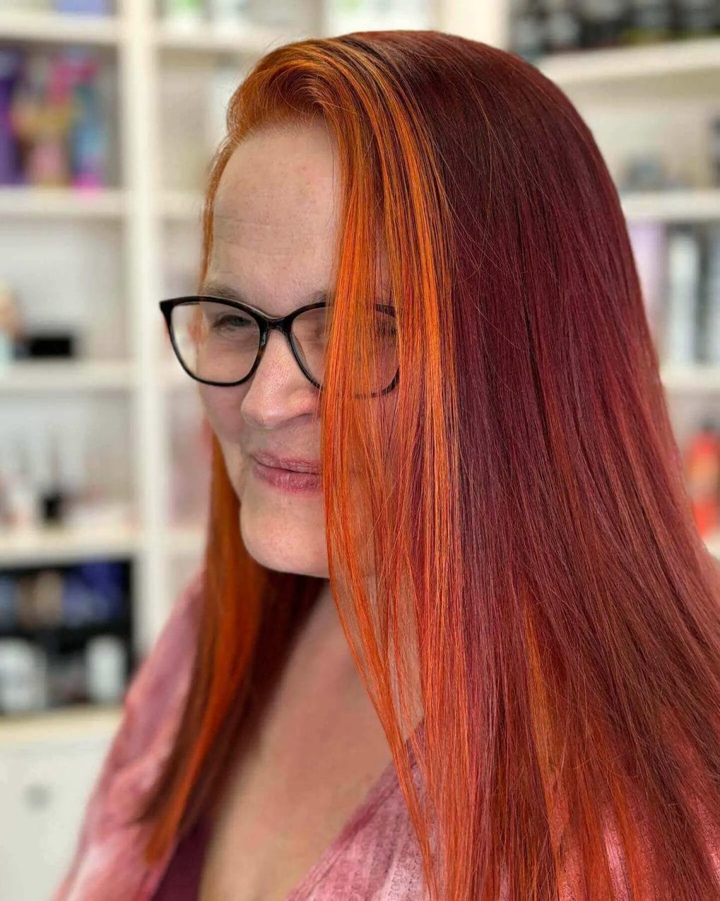 Sleek red hair with vibrant copper money pieces