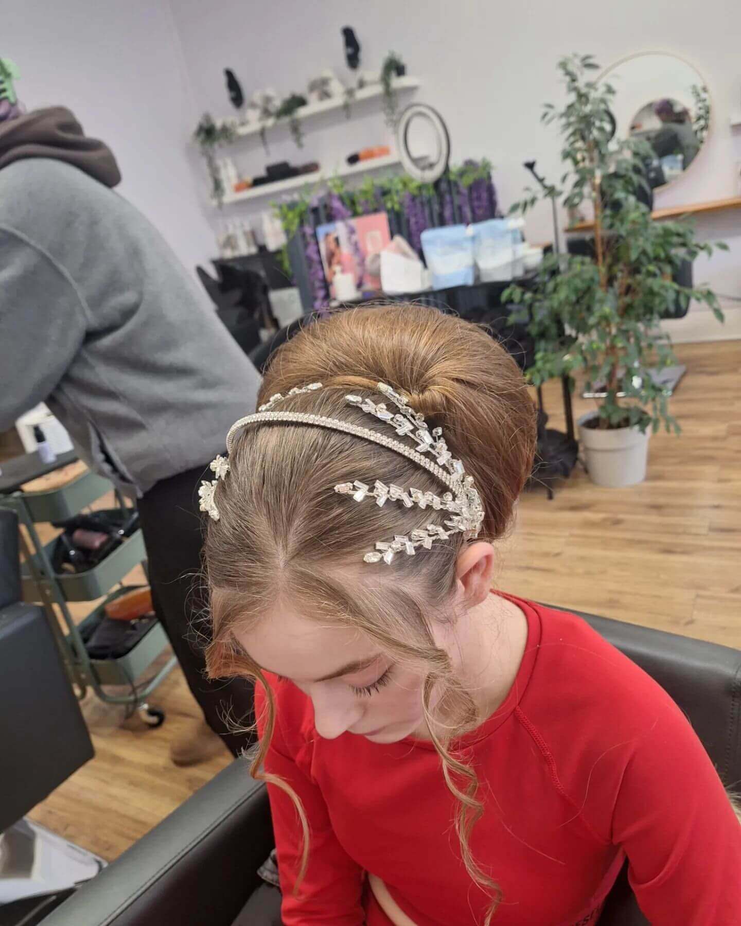 Voluminous bun with sparkling jeweled headbands.