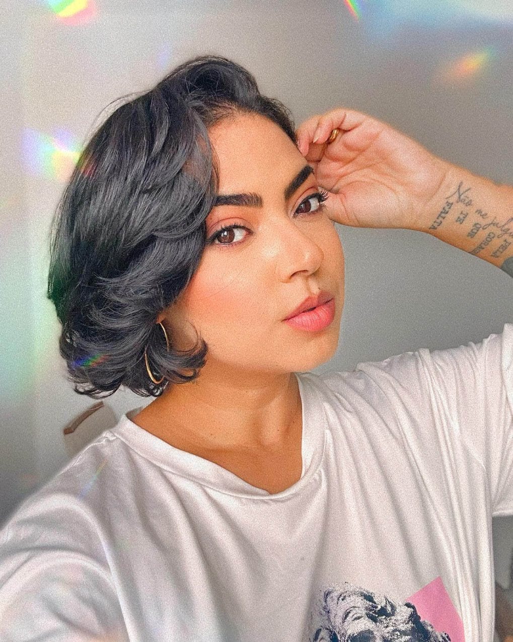 Playful wavy bob with silver ombre and deep side part